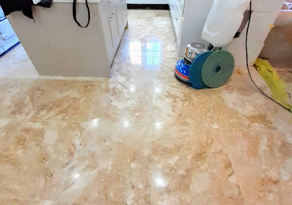 Restored kitchen floor tiles now gleaming with a fresh, polished finish